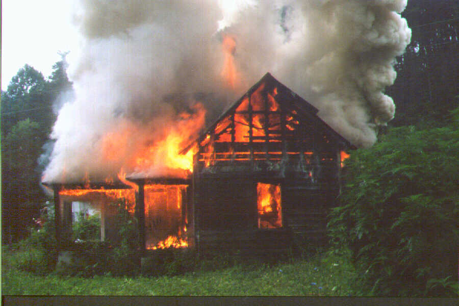 Wooden house on fire 1